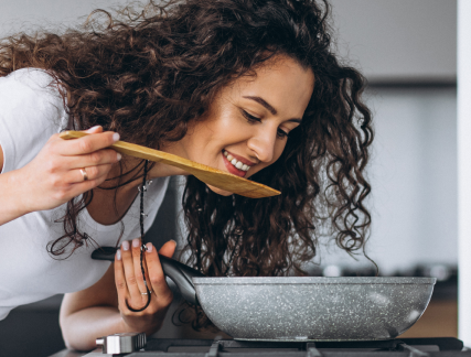 woman cooker making pasta kitchen